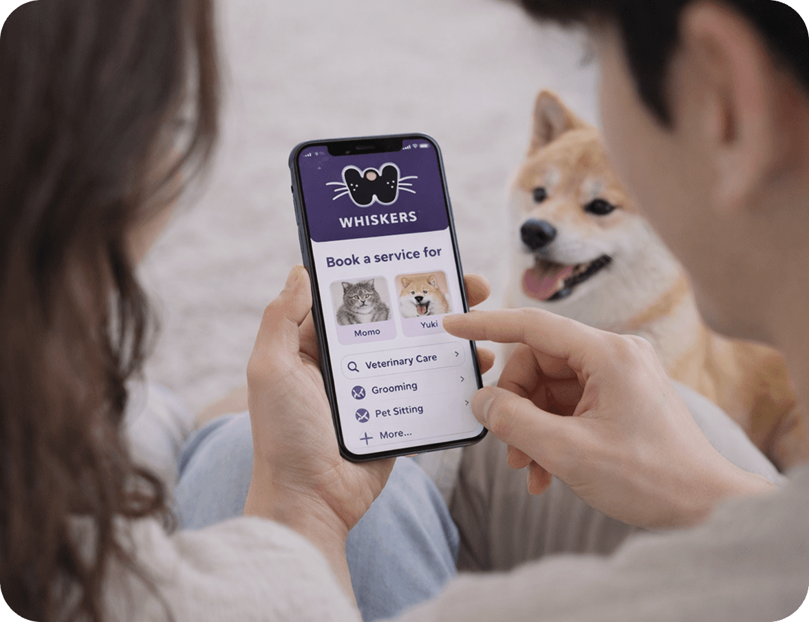 Hand holding phone showing the Whiskers app with pet profiles